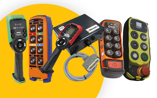 Five different types of crane radio controls side by side