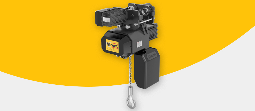 A yellow circle around a LX chain hoist